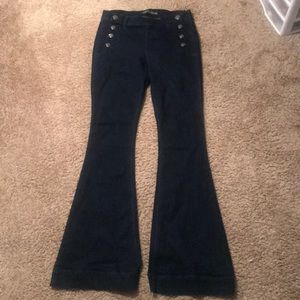 Dark bell bottom women express jeans